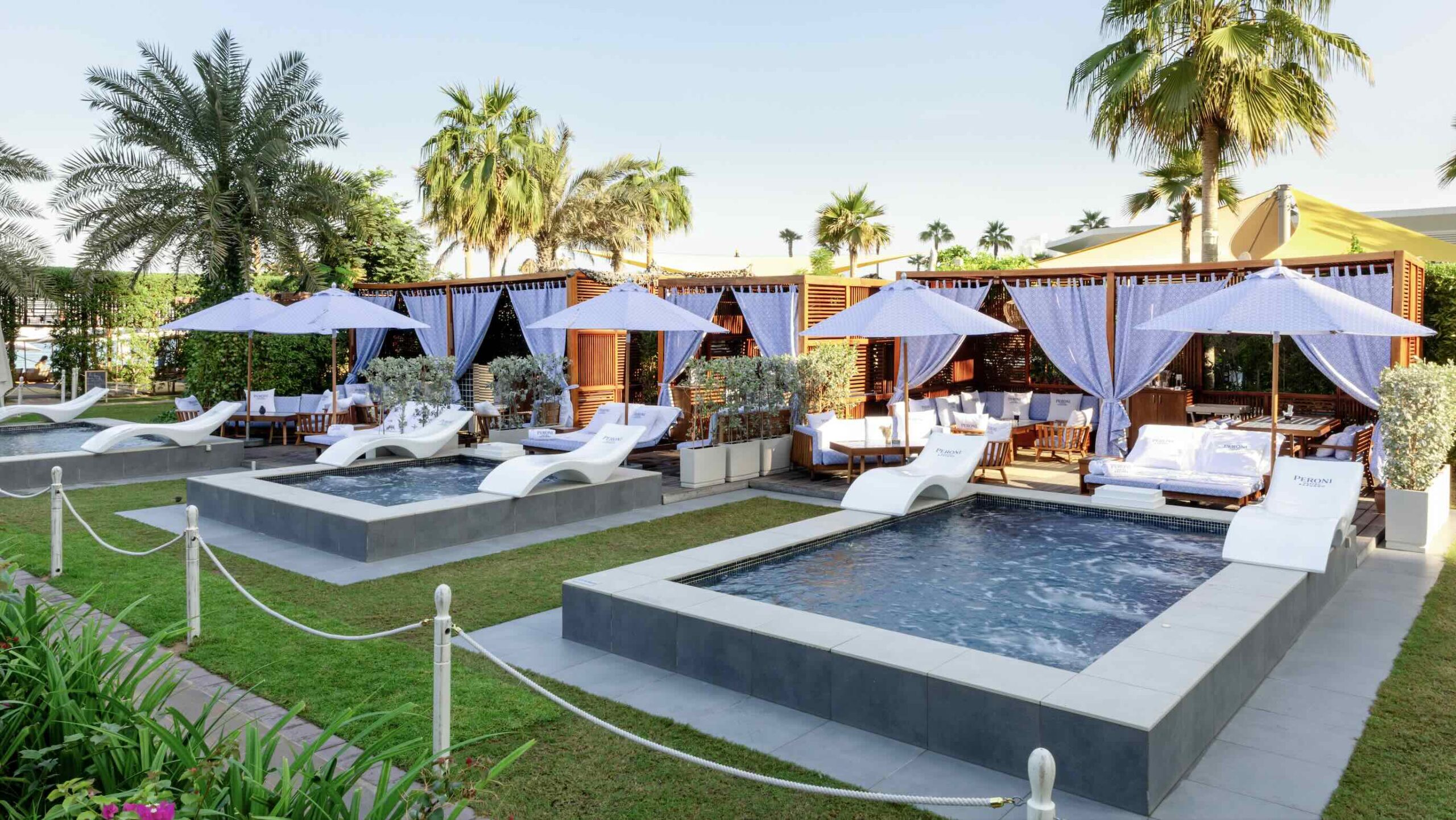 Unwind in Style at Azure Beach&#8217;s charming Peroni Nastro Azzurro cabanas